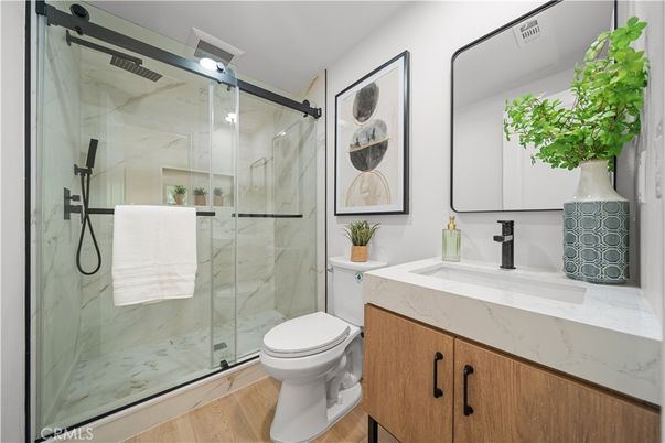 Bathroom, Glass Shower, Interior, Marble Walls, Wood Texture Flooring