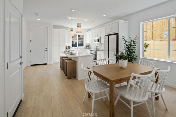 Dining room, Interior, Kitchen, Pendant Lights, Recessed Lighting, Stainless Steel Appliances, Wood Texture Flooring