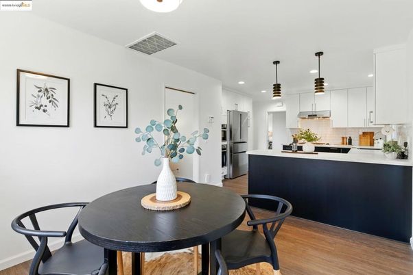 Dining room, Interior, Kitchen, Pendant Lights, Recessed Lighting, Stainless Steel Appliances, Wood Texture Flooring