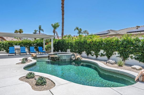 Exterior, Pool, Solar Panels