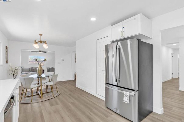 Dining room, Interior, Kitchen, Pendant Lights, Recessed Lighting, Stainless Steel Appliances, Wood Texture Flooring