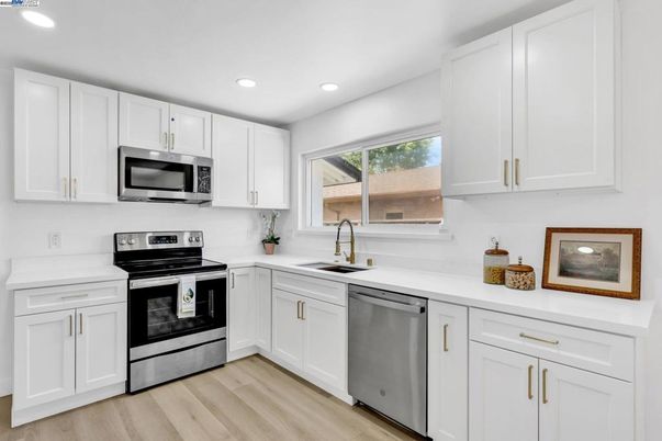 Interior, Kitchen, Recessed Lighting, Stainless Steel Appliances, Wood Texture Flooring