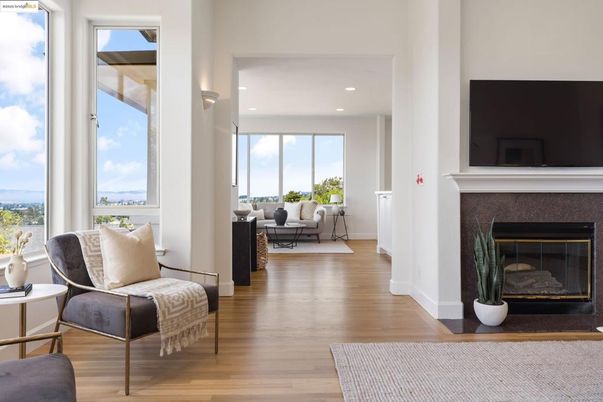 Fireplace, Interior, Living room, Recessed Lighting, Water, Wood Texture Flooring