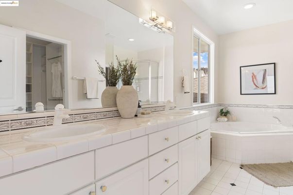 Bathroom, Dual Sink Vanities, Interior, Recessed Lighting, Tile Countertops