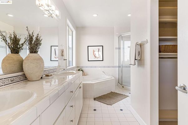 Bathroom, Dual Sink Vanities, Glass Shower, Interior, Recessed Lighting, Tile Countertops