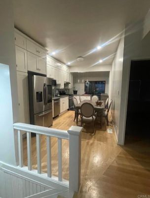 Dining room, Interior, Kitchen, Recessed Lighting, Stainless Steel Appliances, Wood Texture Flooring