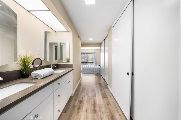 Bathroom, Dual Sink Vanities, Interior, Recessed Lighting, Wood Texture Flooring