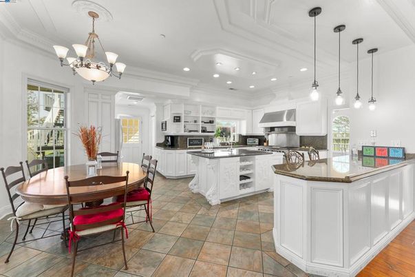 Chandelier, Dining room, Interior, Kitchen, Pendant Lights, Recessed Lighting, Stainless Steel Appliances