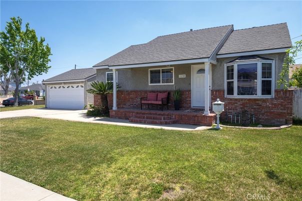 Attached, Backyard, Detached Garage, Exterior, Facade, Brick Facade, Cape Cod
