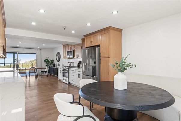 Dining room, Interior, Kitchen, Recessed Lighting, Stainless Steel Appliances, Wood Texture Flooring