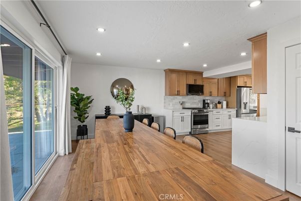 Dining room, Interior, Kitchen, Recessed Lighting, Stainless Steel Appliances, Wood Texture Flooring