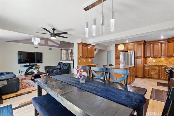 Dining room, Interior, Kitchen, Living room, Pendant Lights, Recessed Lighting, Stainless Steel Appliances, Wood Texture Flooring