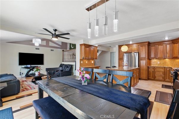 Dining room, Interior, Kitchen, Pendant Lights, Recessed Lighting, Stainless Steel Appliances, Wood Texture Flooring