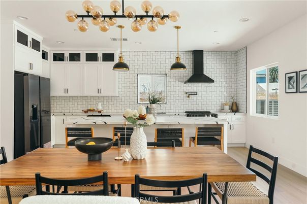 Dining room, Interior, Kitchen, Pendant Lights, Recessed Lighting, Stainless Steel Appliances, Wood Texture Flooring
