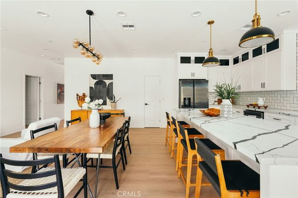 Dining room, Interior, Kitchen, Pendant Lights, Recessed Lighting, Stainless Steel Appliances, Wood Texture Flooring