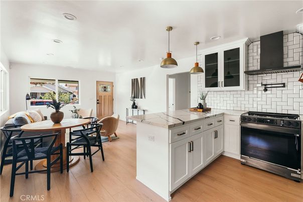 Dining room, Interior, Kitchen, Pendant Lights, Recessed Lighting, Stainless Steel Appliances, Wood Texture Flooring