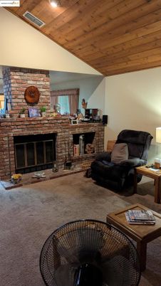 Fireplace, Interior, Living room, Recessed Lighting, Stone Walls, Wooden Ceilings