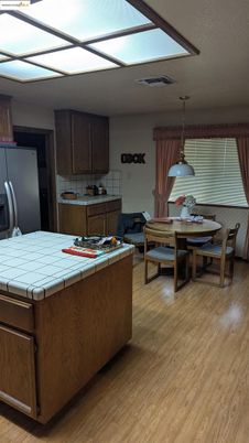 Dining room, Interior, Kitchen, Pendant Lights, Tile Countertops, Wood Texture Flooring