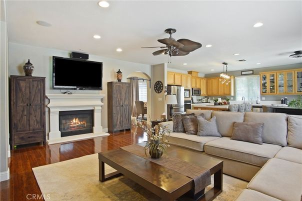 Dining room, Fireplace, Interior, Kitchen, Living room, Pendant Lights, Recessed Lighting, Stainless Steel Appliances, Wood Texture Flooring