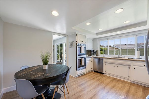 Dining room, Interior, Kitchen, Recessed Lighting, Stainless Steel Appliances, Wood Texture Flooring