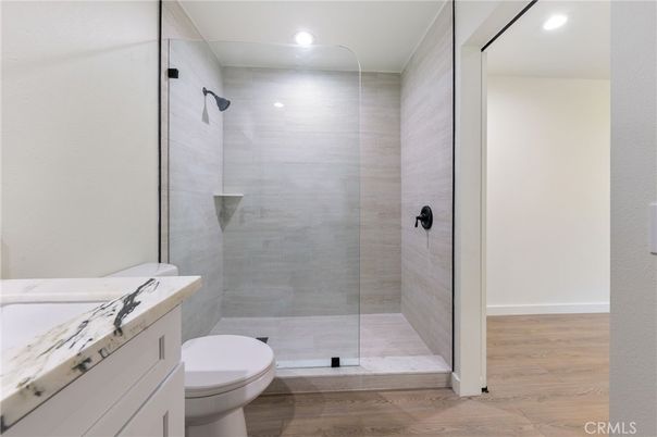 Bathroom, Glass Shower, Interior, Recessed Lighting, Wood Texture Flooring