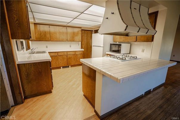 Interior, Kitchen, Tile Countertops, Wood Texture Flooring