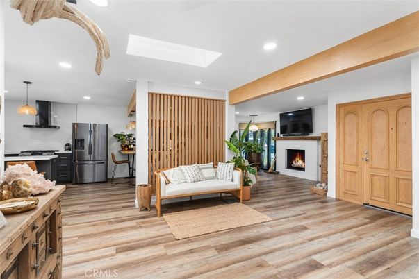 Fireplace, Interior, Kitchen, Living room, Pendant Lights, Recessed Lighting, Stainless Steel Appliances, Wooden Beams, Wood Texture Flooring