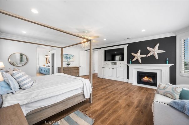 Bedroom, Fireplace, Interior, Recessed Lighting, Wood Texture Flooring