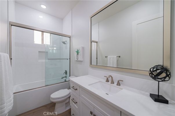 Bathroom, Glass Shower, Interior, Recessed Lighting, Wood Texture Flooring