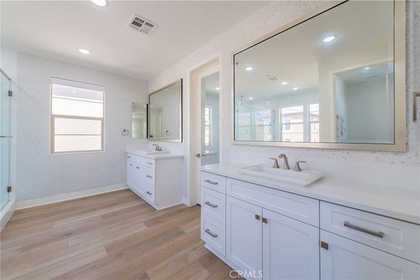 Bathroom, Dual Sink Vanities, Interior, Recessed Lighting, Wood Texture Flooring
