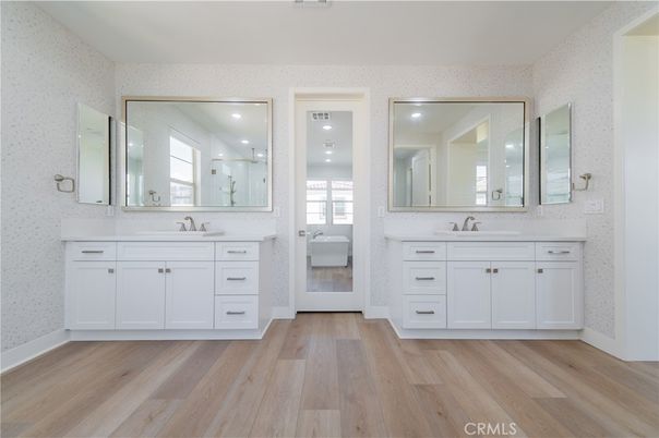 Bathroom, Dual Sink Vanities, Interior, Recessed Lighting, Wood Texture Flooring