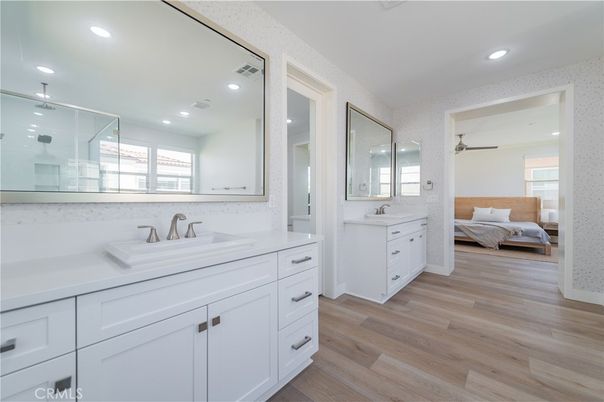 Bathroom, Bedroom, Dual Sink Vanities, Glass Shower, Interior, Recessed Lighting, Wood Texture Flooring