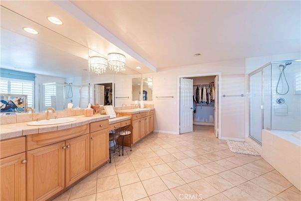 Bathroom, Dual Sink Vanities, Glass Shower, Interior, Recessed Lighting, Tile Countertops