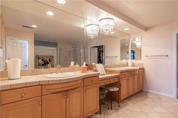 Bathroom, Dual Sink Vanities, Glass Shower, Interior, Recessed Lighting, Tile Countertops