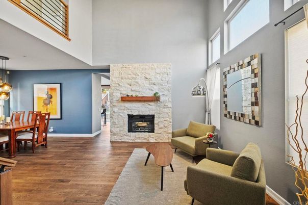 Dining room, Fireplace, Interior, Living room, Pendant Lights, Stone Walls, Wood Texture Flooring