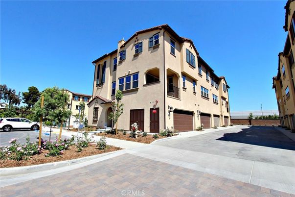 Attached, Exterior, Facade, Spanish Mediterranean