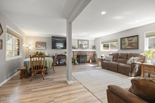Dining room, Fireplace, Interior, Living room, Recessed Lighting, Wood Texture Flooring
