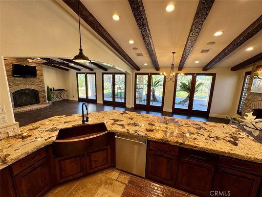 Chandelier, Fireplace, Interior, Kitchen, Pendant Lights, Recessed Lighting, Stone Walls, Wooden Beams