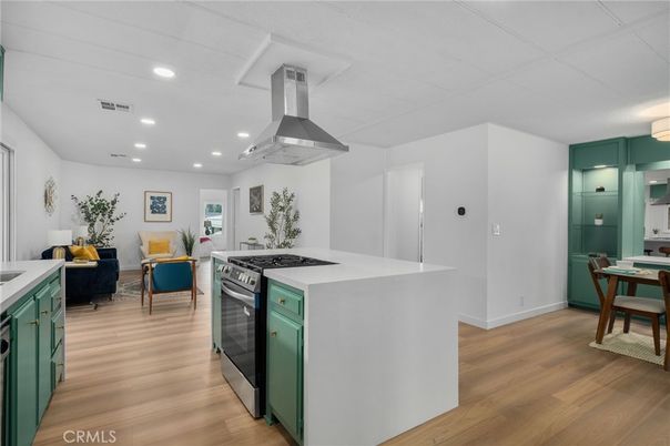 Dining room, Interior, Kitchen, Living room, Recessed Lighting, Stainless Steel Appliances, Wood Texture Flooring