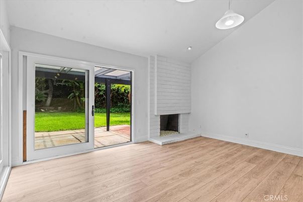 Empty room, Fireplace, Interior, Pendant Lights, Recessed Lighting, Wood Texture Flooring