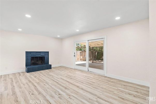 Empty room, Fireplace, Interior, Recessed Lighting, Wood Texture Flooring