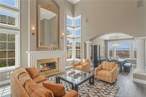 Chandelier, Dining room, Fireplace, Interior, Living room, Pendant Lights, Wood Texture Flooring