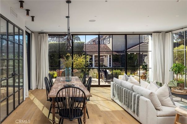 Dining room, Interior, Living room, Pendant Lights, Recessed Lighting, Sun Room, Wood Texture Flooring