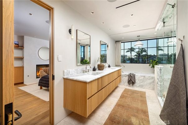 Bathroom, Dual Sink Vanities, Fireplace, Interior, Recessed Lighting, Wood Texture Flooring
