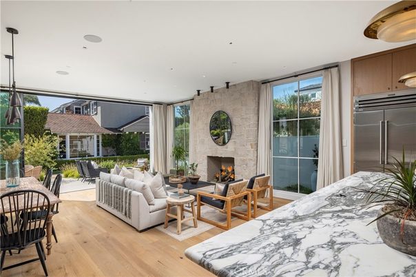 Fireplace, Interior, Kitchen, Living room, Recessed Lighting, Stone Walls, Wood Texture Flooring