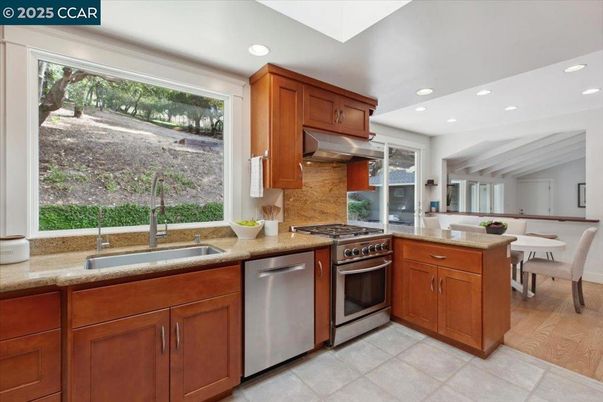 Dining room, Interior, Kitchen, Recessed Lighting, Stainless Steel Appliances, Wood Texture Flooring