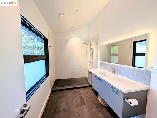 Bathroom, Dual Sink Vanities, Glass Shower, Interior, Recessed Lighting, Wood Texture Flooring