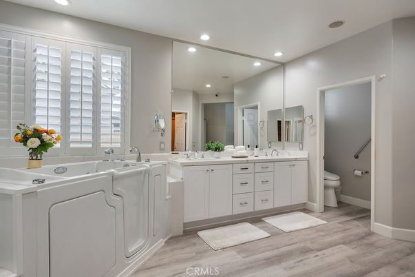 Bathroom, Dual Sink Vanities, Interior, Recessed Lighting, Wood Texture Flooring