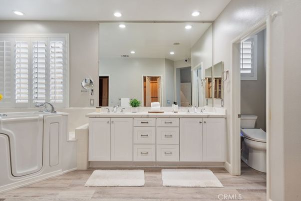 Bathroom, Dual Sink Vanities, Interior, Recessed Lighting, Wood Texture Flooring