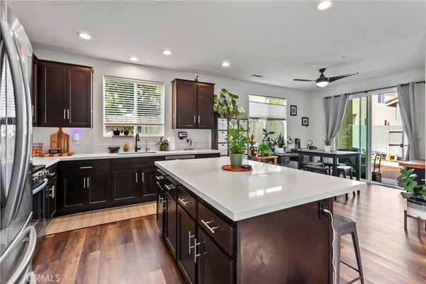 Dining room, Interior, Kitchen, Recessed Lighting, Stainless Steel Appliances, Wood Texture Flooring